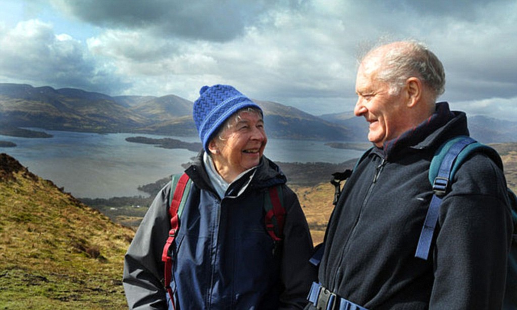 Active elderly people go hill walking in the Trossachs National Park, Scotland. Image shot 04/2010. Exact date unknown.