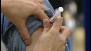 GlaxoSmithKline, flu vaccine maker, gets warning from U.S. FDA